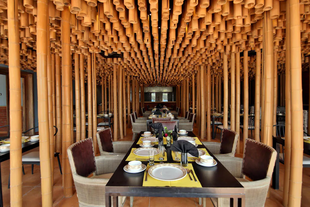 Luxurious restaurant interior with elegant dining tables and chandelier